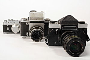 Three vintage old photo cameras